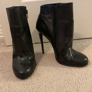 Black snack skin bootie heels